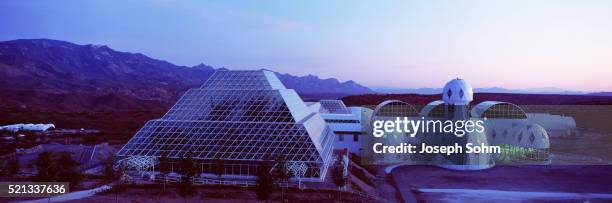 biosphere 2 at sunset - biosphere 2 arizona stock pictures, royalty-free photos & images