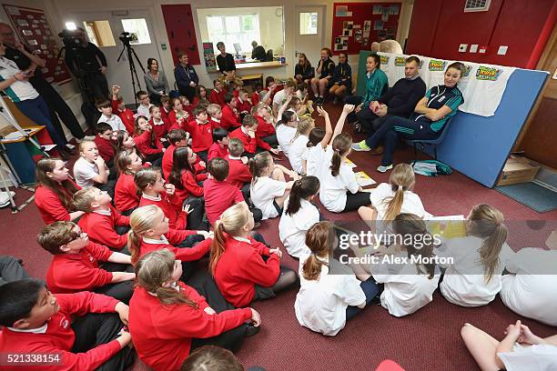 Lydia Greenway of England, author David Tossell and England captain Charlotte Edwards take part in a Q&A session with children from Houghton Primary...