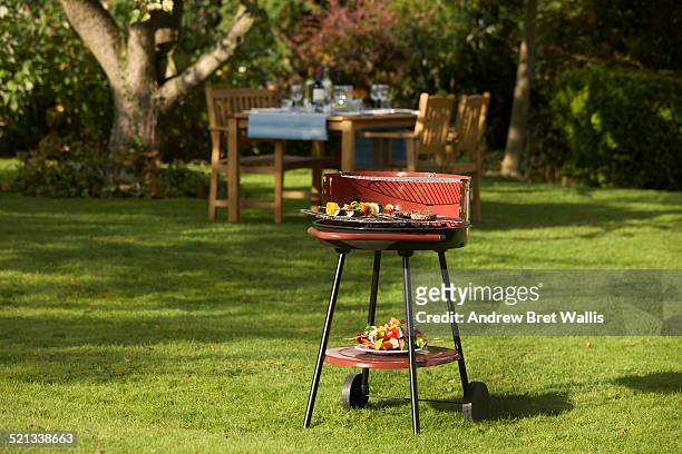 bbq food and table set for garden dining - grill garten stock pictures, royalty-free photos & images