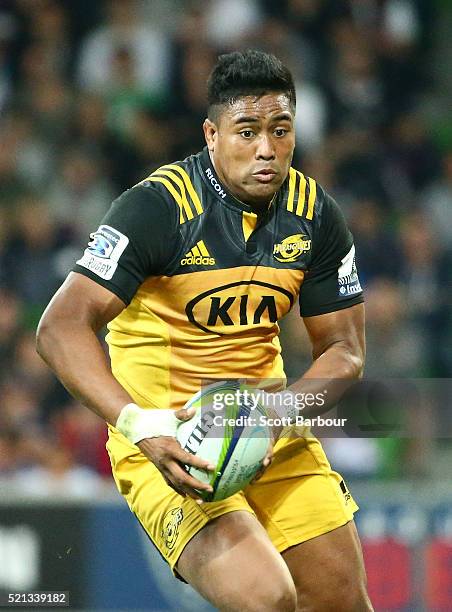 Julian Savea of the Hurricanes runs with the ball during the round eight Super Rugby match between the Rebels and the Hurricanes at AAMI Park on...