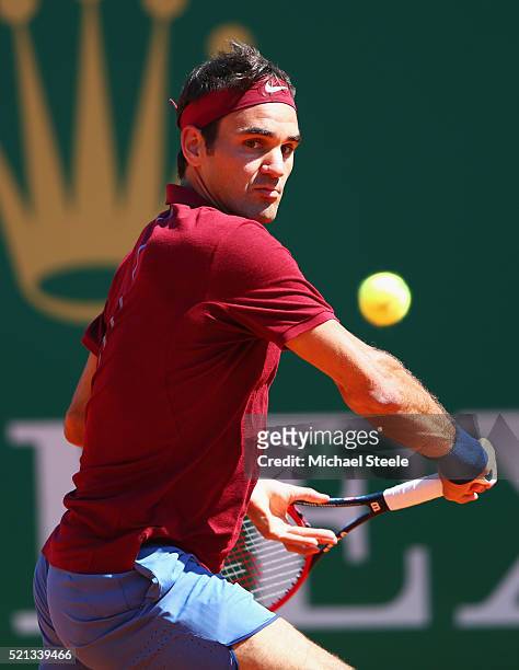 Roger Federer of Switzerland plays a backhand during the quarter final match against Jo-Wilfried Tsonga of France on day six of the Monte Carlo Rolex...