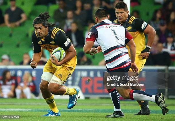 Michael Fatialofa of the Hurricanes runs with the ball during the round eight Super Rugby match between the Rebels and the Hurricanes at AAMI Park on...