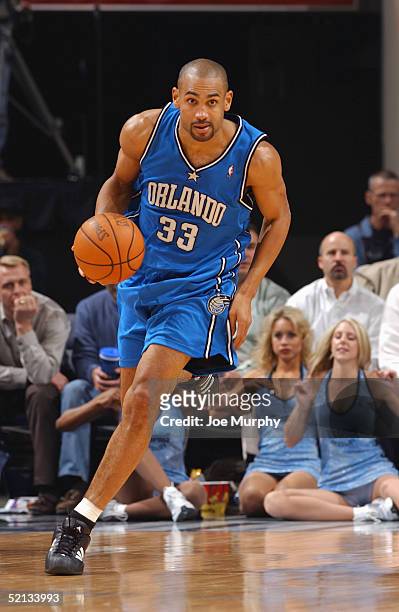 Grant Hill of the Orlando Magic moves the ball during the game with the Memphis Grizzlies at FedEx Forum on January 25, 2005 in Memphis, Tennessee....