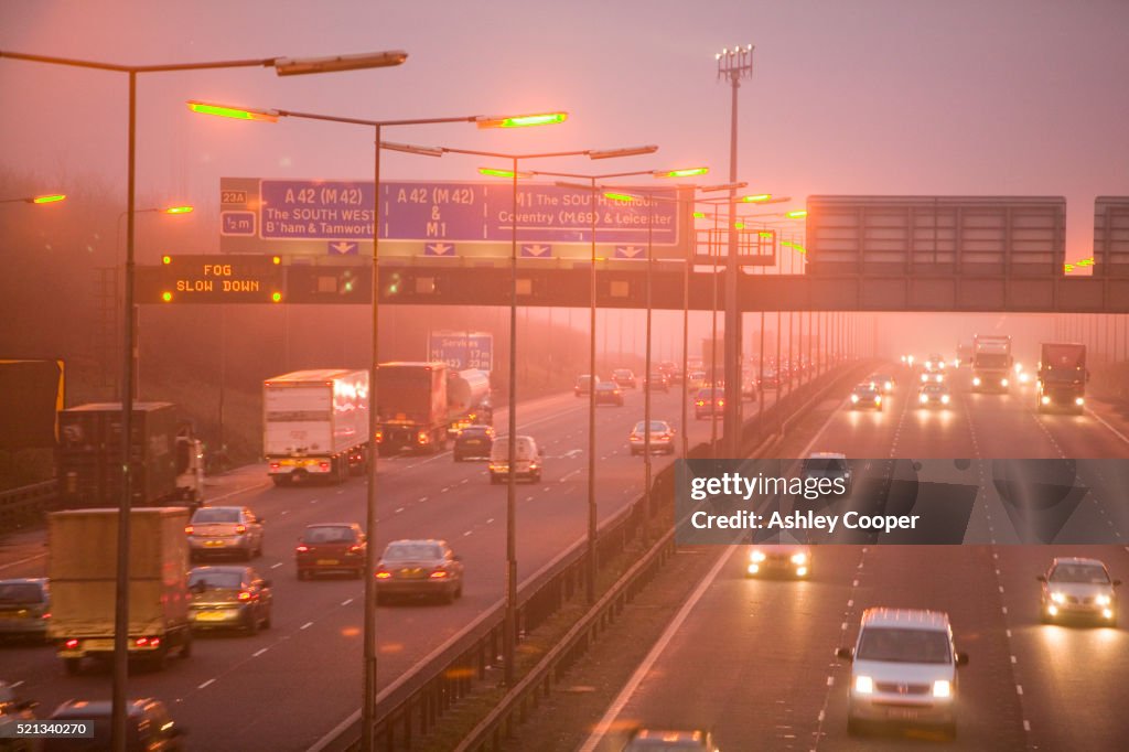 Traffic on Highway in Heavy Fog