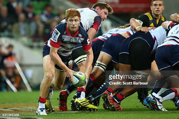 Nic Stirzaker of the Rebels passes the ball during the round eight Super Rugby match between the Rebels and the Hurricanes at AAMI Park on April 15,...