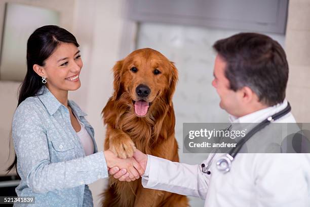 dog at the vet - cute dog with man stock pictures, royalty-free photos & images