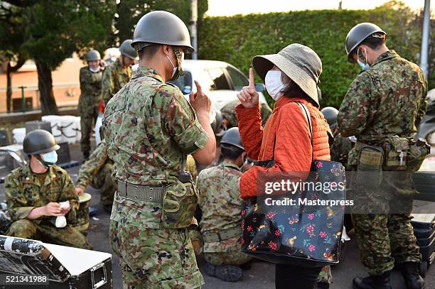 The Japan Self-Defense Forces members operate a soup-run at the evacuation center a day after the 2016 Kumamoto Earthquake at the Mashiki Town Hall...