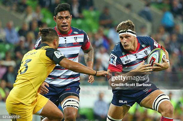 Luke Jones of the Rebels runs with the ball during the round eight Super Rugby match between the Rebels and the Hurricanes at AAMI Park on April 15,...