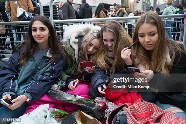 Girls waiting to see their favourite movie stars outside the BAFTA Awards ceremony in London, England, United Kingdom. Elena, Izzy, Bella and Azzurra...