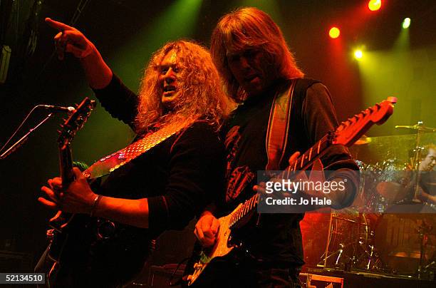 Vocalist Scott Gorham and original guitarist John Sykes of rock band Thin Lizzy performs on stage during London date of their UK tour, at the...