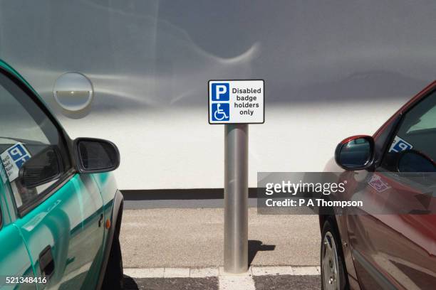 disabled parking - handicap parking space stock pictures, royalty-free photos & images