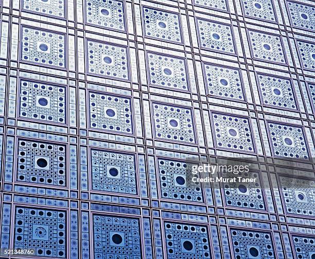 facade of the institut du monde arabe in paris - institut du monde arabe stock pictures, royalty-free photos & images