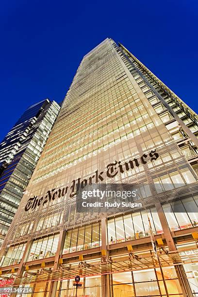 new york times building at dusk - new york times building stock pictures, royalty-free photos & images