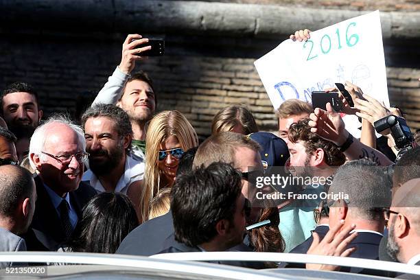 Democratic presidential candidate Bernie Sanders greets people as he leaves the Vatican on April 15, 2016 in Vatican City, Vatican. Candidate Bernie...