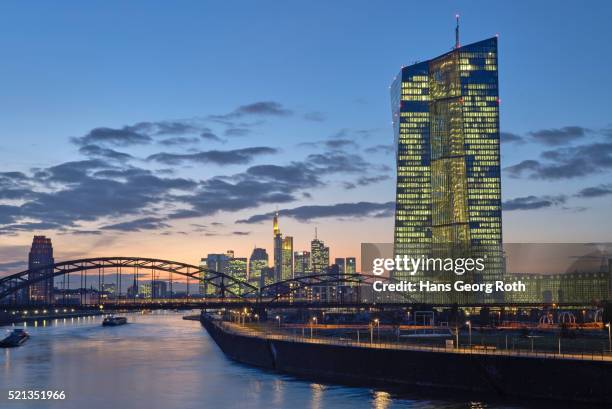 european central bank ecb with banks skyline - central bank stock pictures, royalty-free photos & images