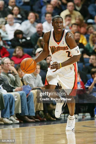 Mickael Pietrus of the Golden State Warriors brings the ball up court against the New Orleans Hornets at the Arena in Oakland, California. NOTE TO...