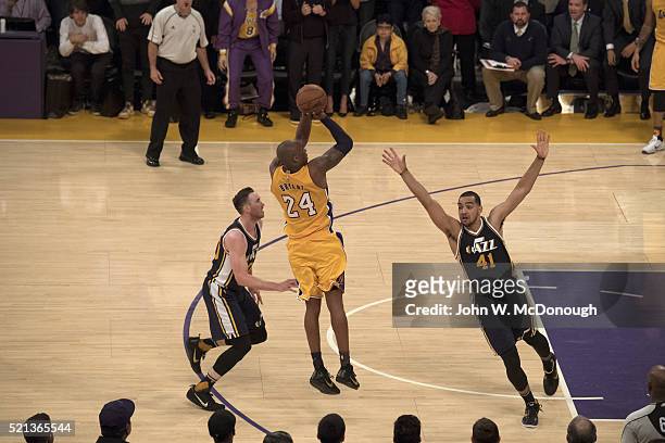 Los Angeles Lakers Kobe Bryant in action, shooting vs Utah Jazz Gordon Hayward and Trey Lyles at Staples Center. Final game of Kobe Bryant's career....