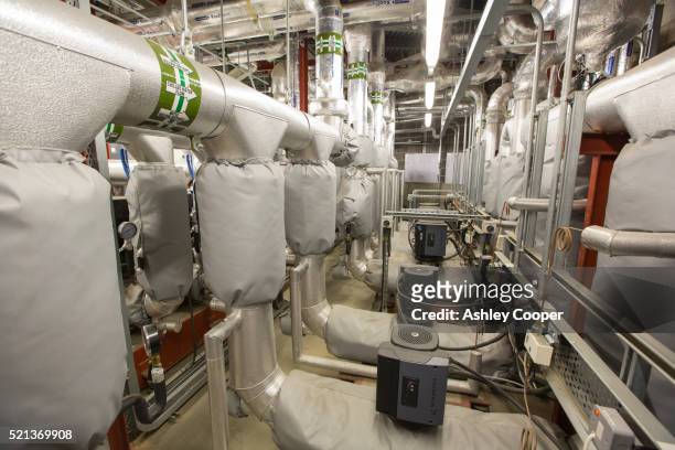 the ground source heat pump system at the crystal building - siemens stock pictures, royalty-free photos & images