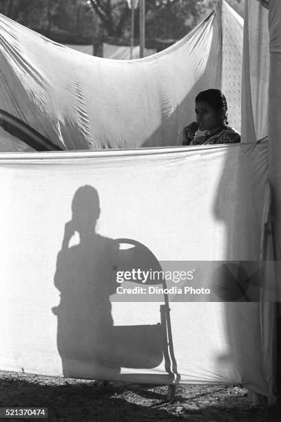 woman and shadow vautha fair, gujarat, india, asia, 1983 - gujarat females stock pictures, royalty-free photos & images