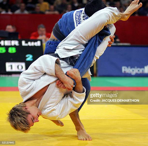 Austrian European champion Ludwig Paischer , fights with ukrania's Georgiy Zantaraya during the qualifications second round of the men's -60 kg...