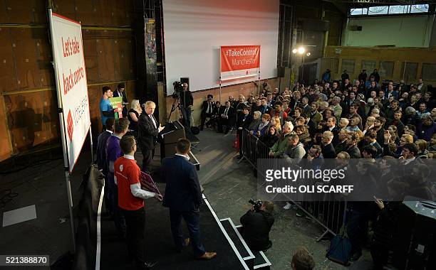 London Mayor and Conservative MP for Uxbridge and South Ruislip, Boris Johnson stands at a podium as he addresses campaigners during a rally for the...