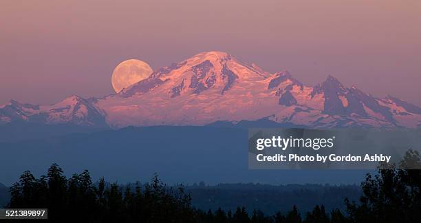 full moon by mount baker - surrey british columbia stock pictures, royalty-free photos & images