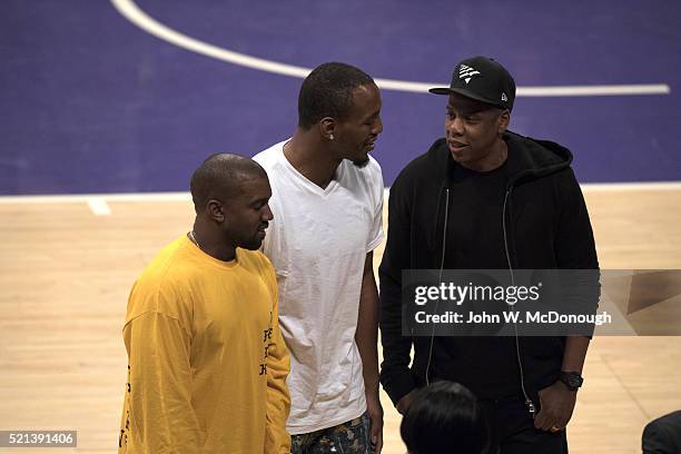 Musicians Jay Z with Kanye West courtside before Los Angeles Lakers vs Utah Jazz game at Staples Center. Final game of Kobe Bryant's career. Los...