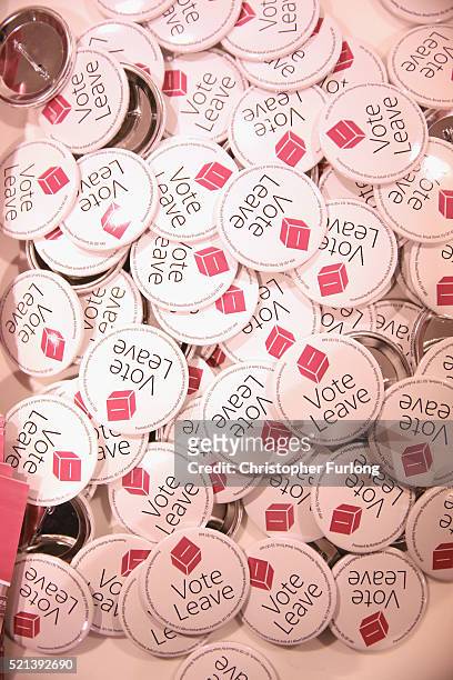 Vote Leave badges are left for supporters as London Mayor Boris Johnson addresses supporters during a rally for the 'Vote Leave' campaign on April...