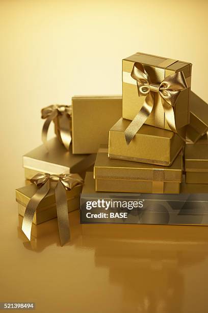 Present Stack Gold 615 Gold Present Stack Stock Photos, High-Res Pictures, and Images ...