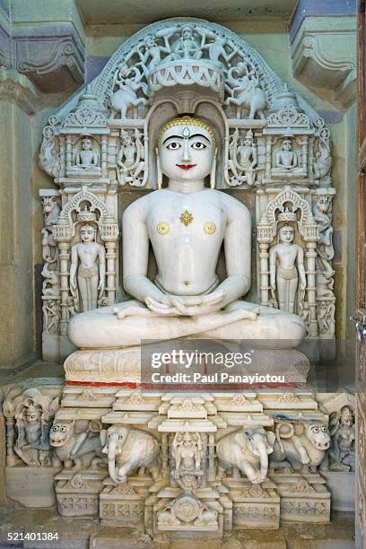 sculpture of mahavira at the jain temple in jaisalmer, rajasthan, india - jain stock pictures, royalty-free photos & images