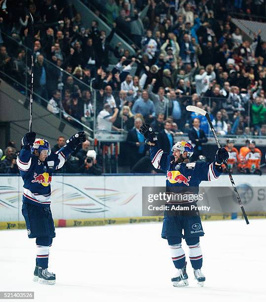 Jeremey Dehner of Red Bull Muenchen celebrates scoring the winning goal during the DEL Ice Hockey Playoffs Final Game One between EHC Red Bull...