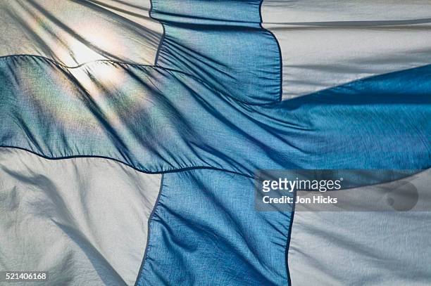close-up of finnish flag - finish flag stock pictures, royalty-free photos & images