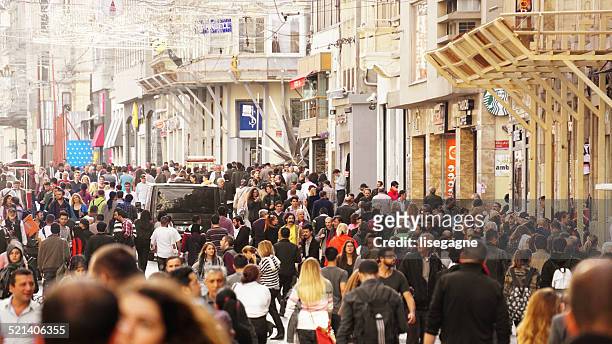 große menschenmenge in taksim, istanbul - sea of marmara stock-fotos und bilder