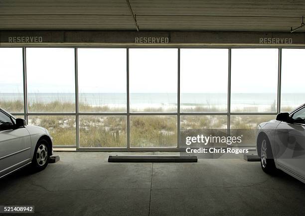 reserved parking space in a parking garage - private view stock-fotos und bilder