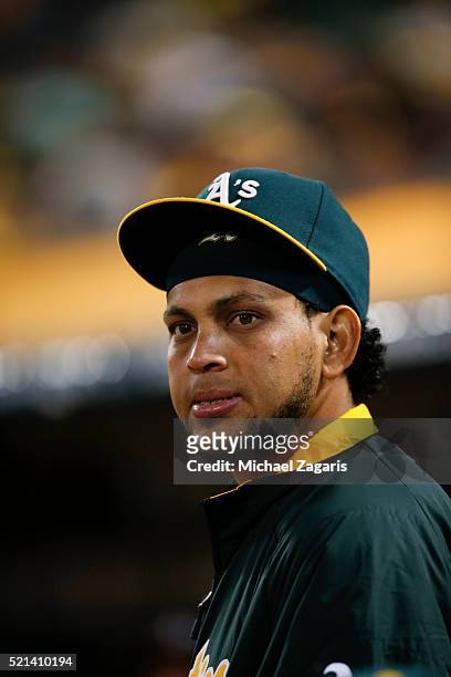 Henderson Alvarez of the Oakland Athletics stands in the dugout during the game against the Chicago White Sox at Oakland Coliseum on April 4, 2016 in...