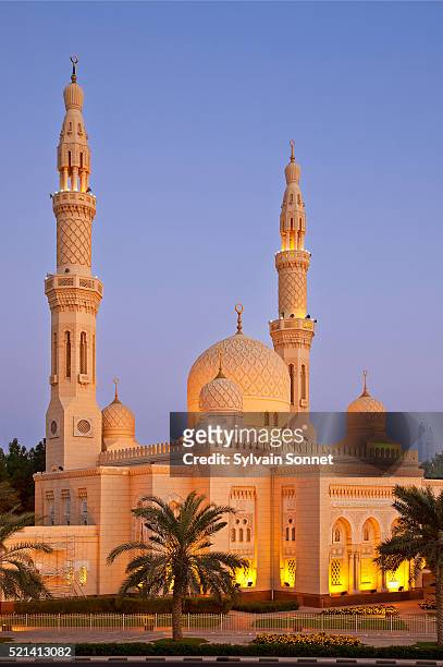 dubai, jumeirah mosque at dusk - mosque stock pictures, royalty-free photos & images