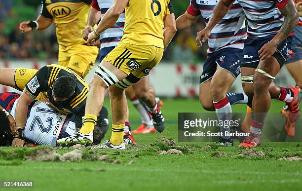 General view of the surface of AAMI park after large divots of turf were ripped up during a scrum during the round eight Super Rugby match between...