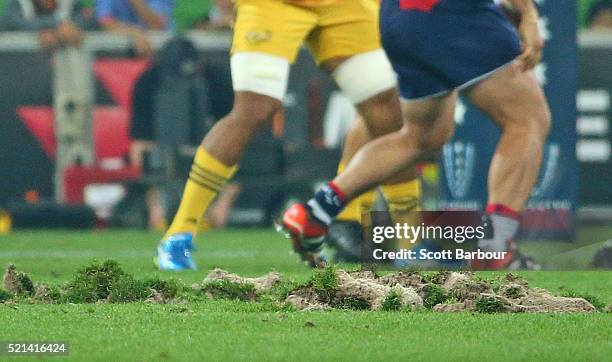 General view of the surface of AAMI park after large divots of turf were ripped up during a scrum during the round eight Super Rugby match between...