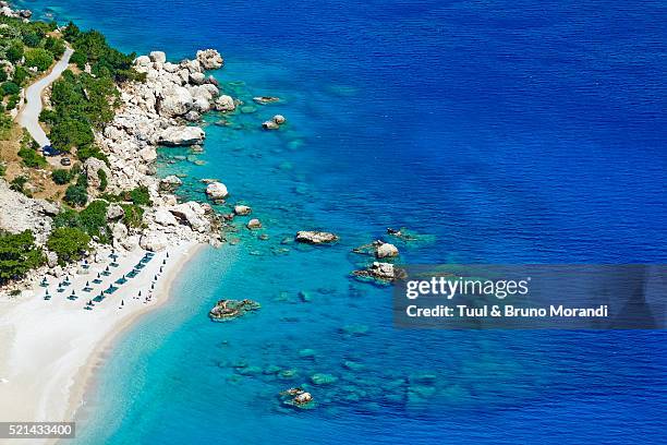 greece, dodecanese, karpathos, apella beach - mar egeo fotografías e imágenes de stock