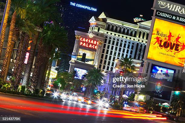 the bright lights of "the strip". - las vegas street stock pictures, royalty-free photos & images