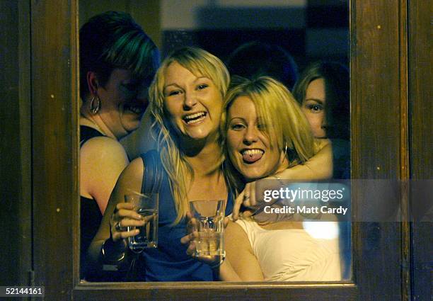 Drinkers are seen in a pub on February 5 2005, Bristol, England. This weekend was the last one before pubs and clubs can apply for extended licences....