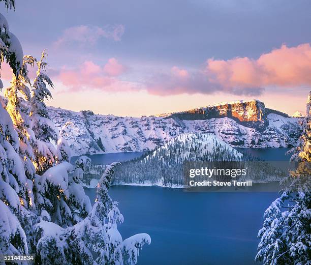 fresh snow at crater lake national park - crater lake stock pictures, royalty-free photos & images