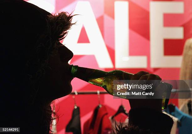 Drinker enjoys a bottle of beer on February 5 2005, Bristol, England. This weekend was the last one before pubs and clubs can apply for extended...
