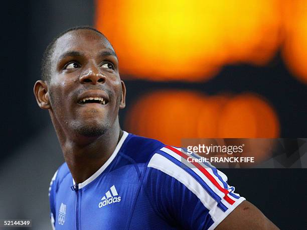 - Photo prise le 22 aout 2004 a Athenes lors des Jeux olympiques de l'athlete Ronald Pognon lors des demi-finales du 100 m. Pognon a battu le record...