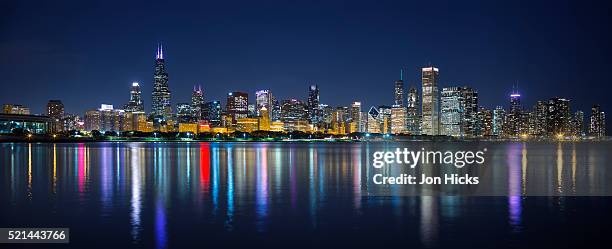 the chicago skyline over lake michigan - chicago skyline stock pictures, royalty-free photos & images