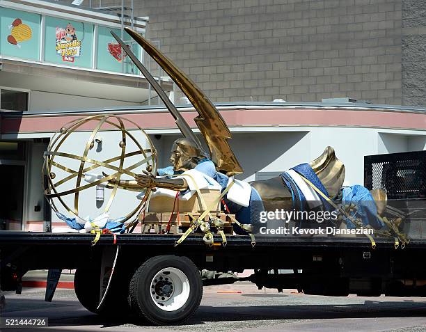 The 18-foot 1,750 pound golden Emmy statuette is transported on a flat bed truck to be installed at Television Academy's North Hollywood Campus April...