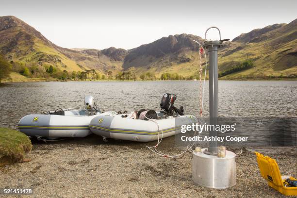 preparing to take sediment cores from the bottom of buttermere lake - sediment stock-fotos und bilder