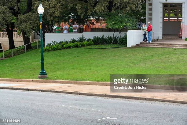 an 'x' marks the spot on elm street in dealey plaza, dallas, where john f. kennedy was shot - elm street stock pictures, royalty-free photos & images