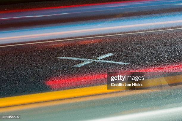 an 'x' marks the spot on elm street in dealey plaza, dallas, where john f. kennedy was shot - elm street stock pictures, royalty-free photos & images
