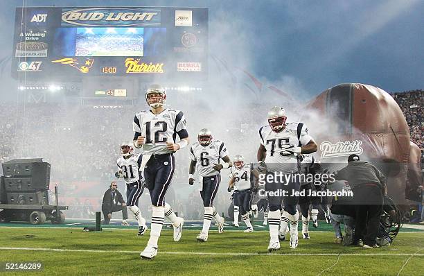 Quarterback Tom Brady of the New England Patriots leads his team onto the field before the start of Super Bowl XXXIX against the Philadelphia Eagles...